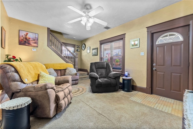 800 Romine Ave, Port Vue, PA 15133 - carpeted living room with stairway, ceiling fan, and baseboards