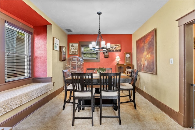 800 Romine Ave, Port Vue, PA 15133 - carpeted dining room featuring a chandelier and baseboards