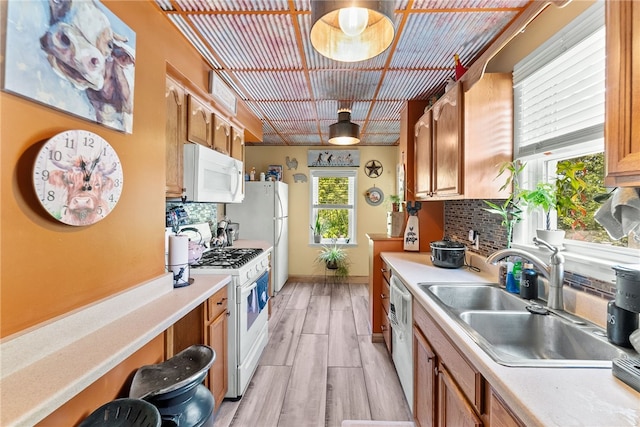 800 Romine Ave, Port Vue, PA 15133 - kitchen with white appliances, a sink, and light countertops