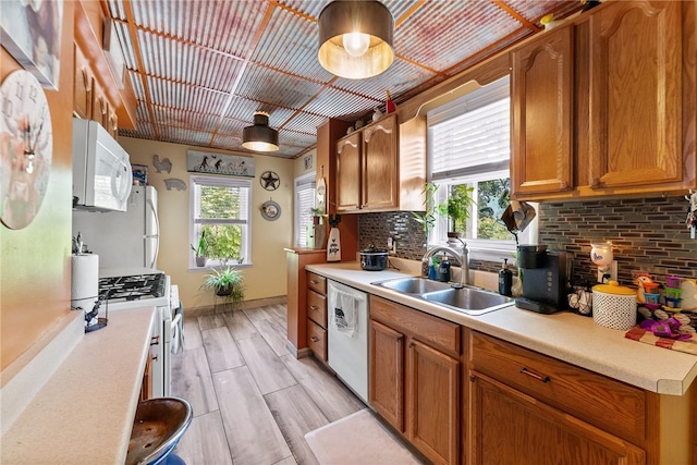 800 Romine Ave, Port Vue, PA 15133 - kitchen with white appliances, a sink, and light countertops