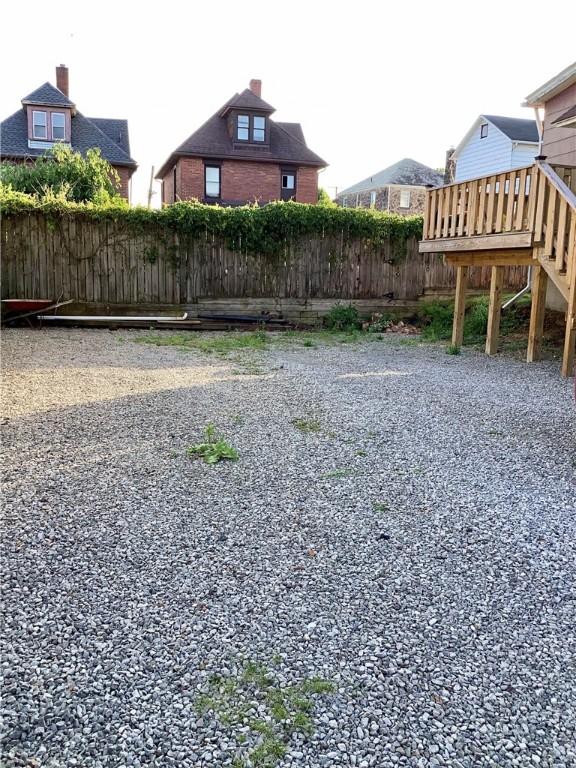 923 Fentzel, Tarentum, PA 15084 - view of yard featuring stairs and a wooden deck