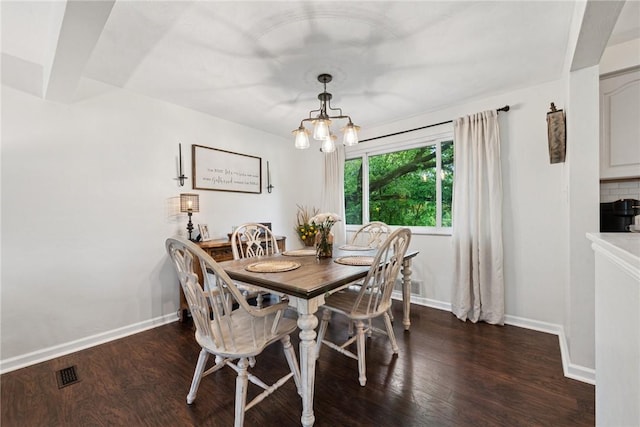 1703 Barry Dr, North Huntingdon, PA 15642 - dining space featuring wood finished floors, baseboards, and a chandelier