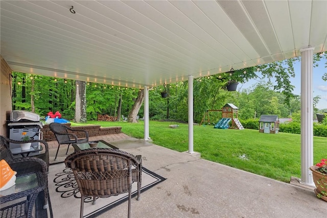 1703 Barry Dr, North Huntingdon, PA 15642 - view of patio with a playground, grilling area, and an outdoor living space
