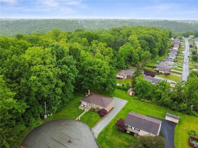 1703 Barry Dr, North Huntingdon, PA 15642 - aerial perspective of suburban area featuring a heavily wooded area