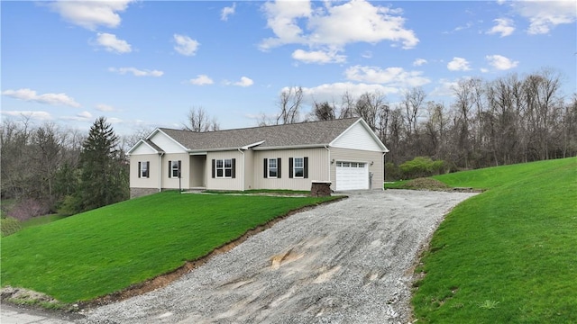 480 Matty, Rostraver, PA 15012 - ranch-style home featuring an attached garage, gravel driveway, and a front lawn