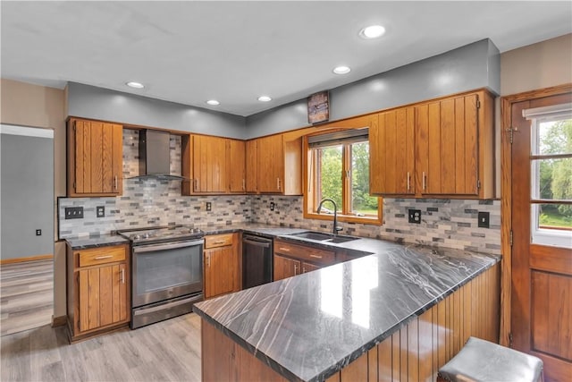206 Brook Hollow Rd, Pa, PA 15666 - kitchen with wall chimney range hood, stainless steel electric stove, brown cabinets, a sink, and dishwashing machine