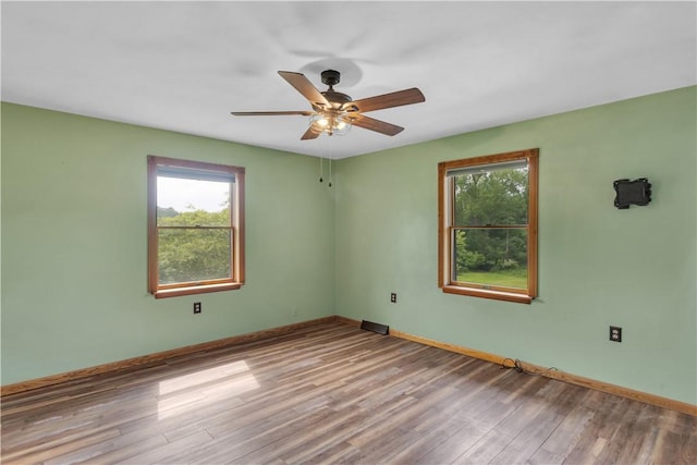 206 Brook Hollow Rd, Pa, PA 15666 - spare room with plenty of natural light, wood finished floors, ceiling fan, and baseboards