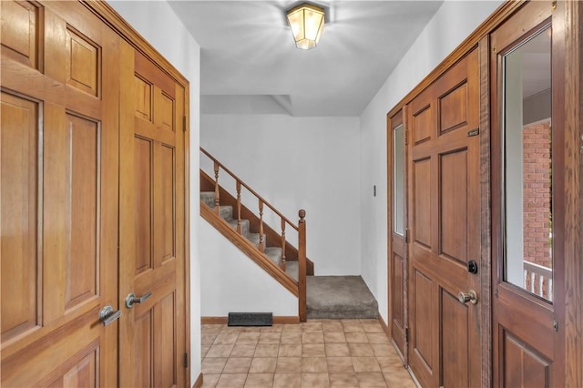 206 Brook Hollow Rd, Pa, PA 15666 - entryway featuring stairway and baseboards