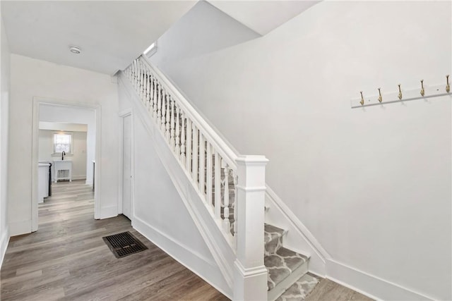 2 Elmont St, Crafton Heights, PA 15205 - stairs featuring wood finished floors and baseboards