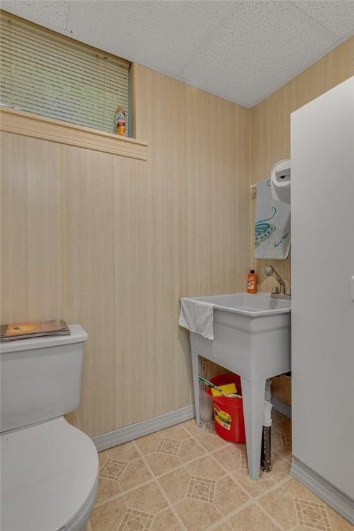 117 Bayberry Ln, Cranberry Twp, PA 16066 - half bathroom with toilet, baseboards, and wooden walls