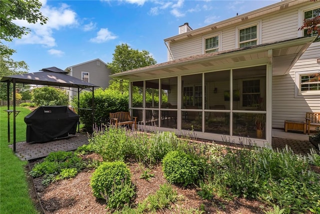 117 Bayberry Ln, Cranberry Twp, PA 16066 - rear view of house featuring a gazebo, a sunroom, and a chimney