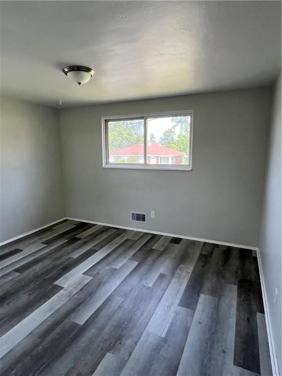 10807 Highpoint Dr, Penn Hills, PA 15235 - unfurnished room featuring dark wood-style flooring and baseboards