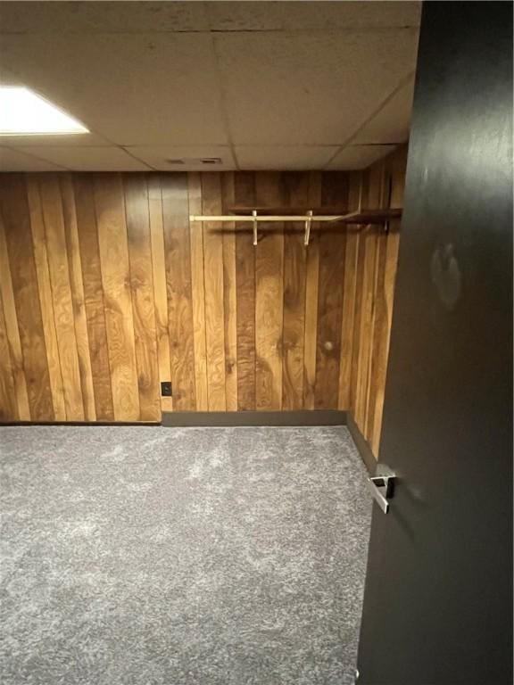 10807 Highpoint Dr, Penn Hills, PA 15235 - finished basement with a paneled ceiling, carpet, and wood walls