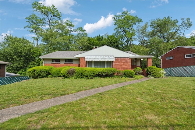 1341 Foxboro Dr, Monroeville, PA 15146 - view of front facade with brick siding and a front yard