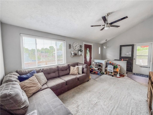 2787 Queensboro Ave, Baldwin Twp, PA 15226 - living area featuring healthy amount of natural light, a ceiling fan, vaulted ceiling, a textured ceiling, and carpet flooring