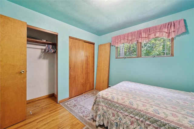 178 Sagamore Rd, Cowanshanock Twp, PA 16249 - bedroom with wood finished floors, multiple closets, and baseboards