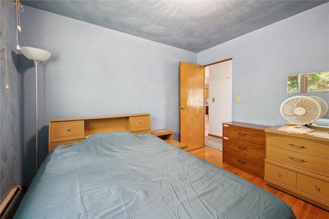 178 Sagamore Rd, Cowanshanock Twp, PA 16249 - bedroom featuring a baseboard radiator and light wood-style flooring