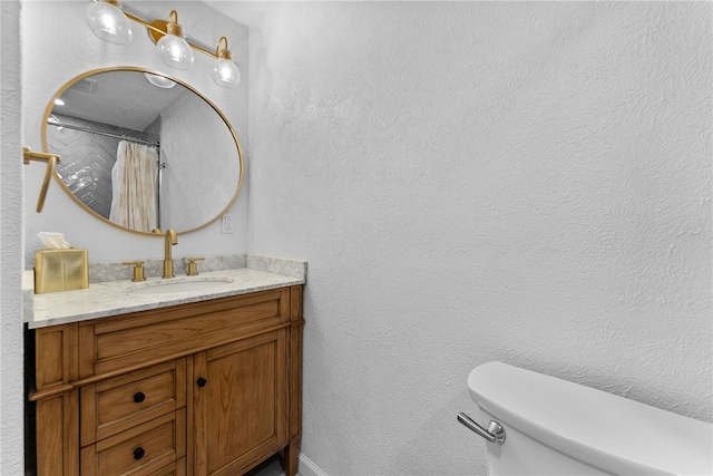 2406 Rolling Farms Rd, Shaler, PA 15116 - bathroom with toilet, vanity, a textured wall, baseboards, and a shower with curtain