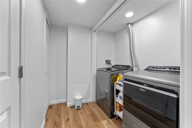 2406 Rolling Farms Rd, Shaler, PA 15116 - washroom with washing machine and clothes dryer and light wood finished floors