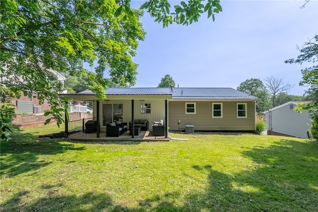 2406 Rolling Farms Rd, Shaler, PA 15116 - rear view of property with outdoor lounge area, a patio, metal roof, central AC unit, and board and batten siding