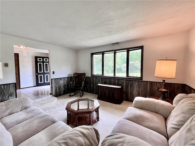 590 N Kings Creek Rd, Pa, PA 15021 - living room with a wainscoted wall, light colored carpet, and wooden walls