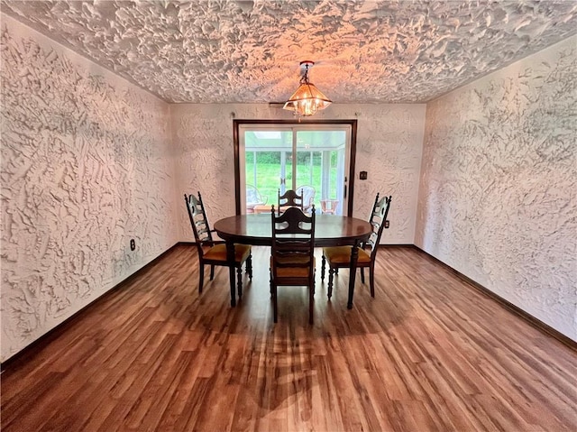 590 N Kings Creek Rd, Pa, PA 15021 - dining space featuring a textured wall and wood finished floors