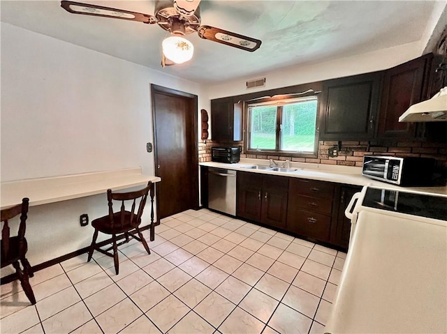 590 N Kings Creek Rd, Pa, PA 15021 - kitchen with stainless steel dishwasher, stove, a sink, decorative backsplash, and a ceiling fan