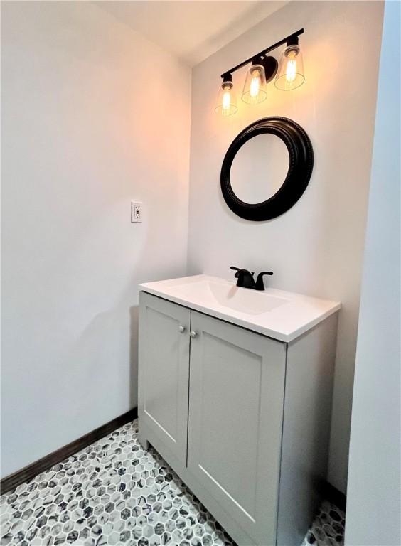 590 N Kings Creek Rd, Pa, PA 15021 - bathroom featuring vanity and baseboards