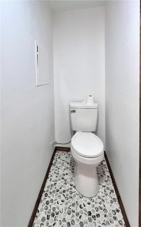 590 N Kings Creek Rd, Pa, PA 15021 - bathroom featuring baseboards, toilet, and tile patterned flooring