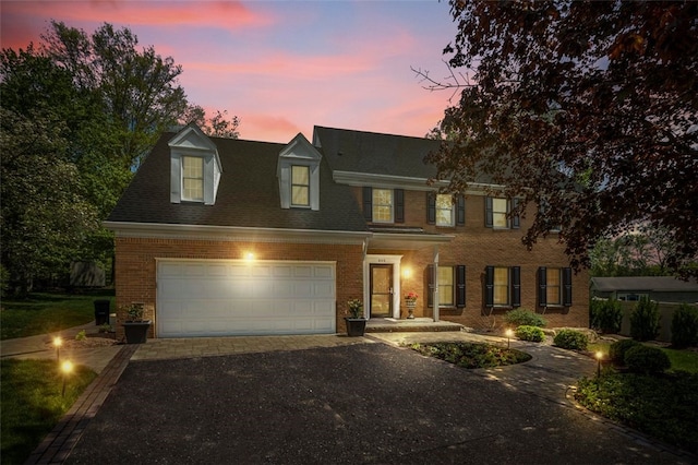 809 Timber Trl, Collier Twp, PA 15071 - view of front of house featuring driveway, a garage, and brick siding