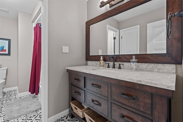 809 Timber Trl, Collier Twp, PA 15071 - bathroom with toilet, vanity, baseboards, and shower / tub combo