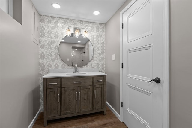 809 Timber Trl, Collier Twp, PA 15071 - bathroom featuring wallpapered walls, vanity, wood finished floors, baseboards, and a shower