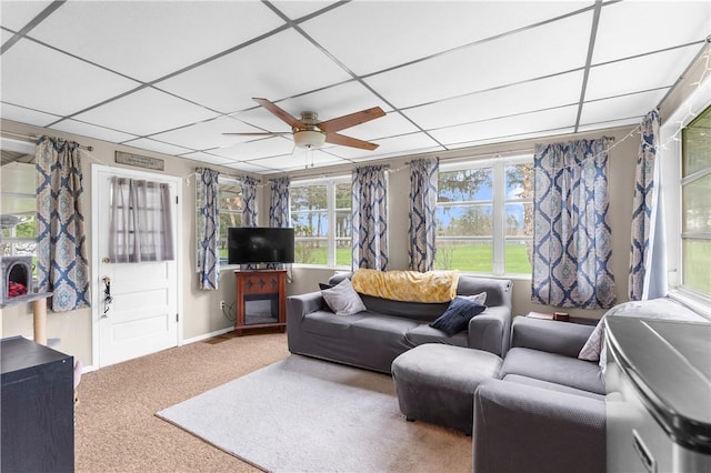 507 Moss Ln, Pymatuning Twp, PA 16125 - carpeted living area featuring a paneled ceiling, ceiling fan, and baseboards