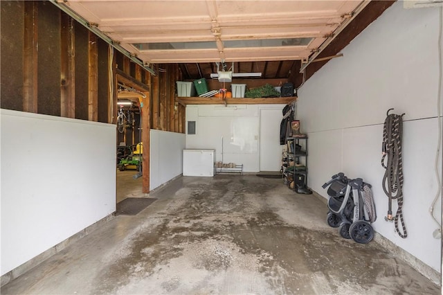 507 Moss Ln, Pymatuning Twp, PA 16125 - garage featuring a garage door opener