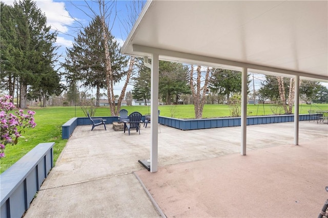 507 Moss Ln, Pymatuning Twp, PA 16125 - view of patio / terrace featuring an outdoor fire pit
