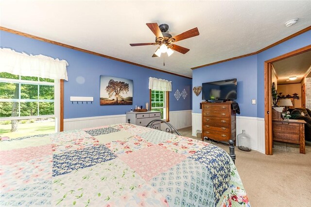 214 Fullingmill Rd, Jefferson Twp Mer, PA 16137 - bedroom featuring a wainscoted wall, ornamental molding, carpet flooring, and ceiling fan