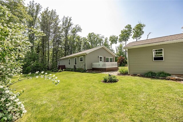 214 Fullingmill Rd, Jefferson Twp Mer, PA 16137 - view of grassy yard featuring a wooden deck
