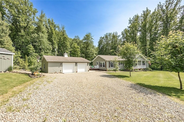 214 Fullingmill Rd, Jefferson Twp Mer, PA 16137 - single story home with an outbuilding, a detached garage, a front yard, and a chimney