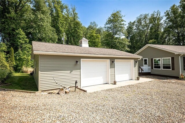 214 Fullingmill Rd, Jefferson Twp Mer, PA 16137 - detached garage featuring view of scattered trees