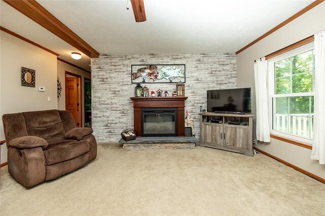 214 Fullingmill Rd, Jefferson Twp Mer, PA 16137 - carpeted living area with crown molding, an accent wall, baseboards, a fireplace, and a ceiling fan