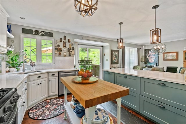 675 Village Green Blvd E, Adams Twp, PA 16046 - kitchen featuring green cabinetry, stainless steel appliances, light countertops, white cabinetry, and a chandelier