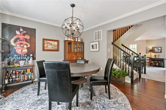 675 Village Green Blvd E, Adams Twp, PA 16046 - dining room featuring ornamental molding, a chandelier, stairs, and wood finished floors
