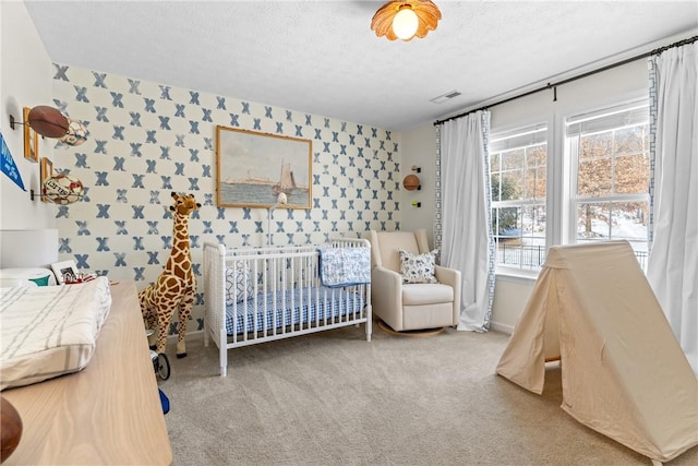 108 General Ct, Jackson Twp But, PA 16063 - bedroom with wallpapered walls, carpet floors, a textured ceiling, an accent wall, and baseboards