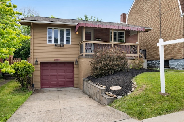 1624 Rockford Ave, Brookline, PA 15226 - view of front of house with a chimney, concrete driveway, a garage, and a front yard