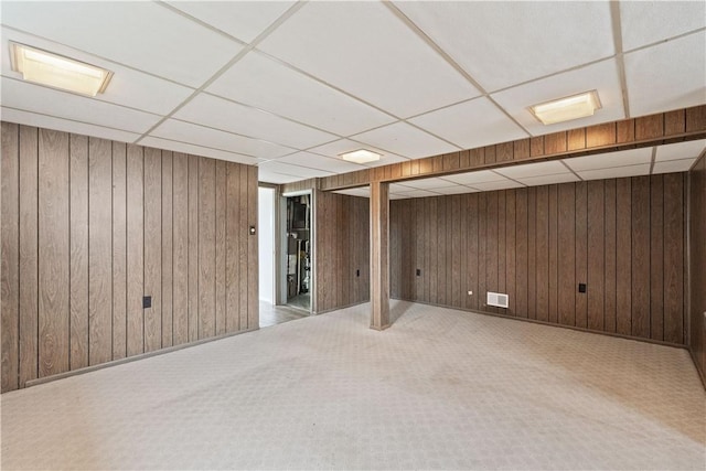 124 Wyndfield Dr, East Huntingdon, PA 15666 - finished basement featuring a paneled ceiling and wood walls