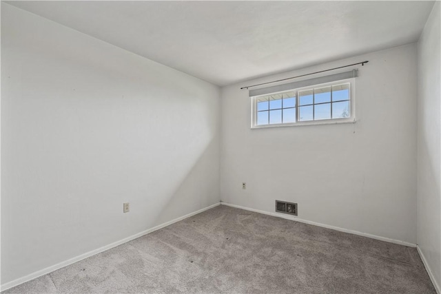 124 Wyndfield Dr, East Huntingdon, PA 15666 - carpeted empty room featuring baseboards
