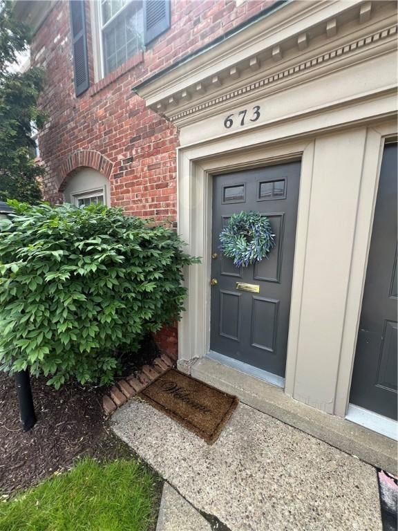 673 Robinwood Dr, Scott Twp Sal, PA 15216 - view of exterior entry with brick siding