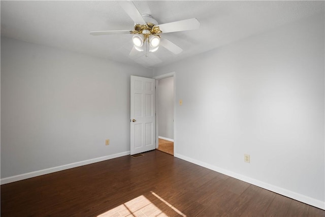 1299 Oakridge Rd, South Fayette, PA 15057 - spare room featuring dark wood finished floors, baseboards, and ceiling fan