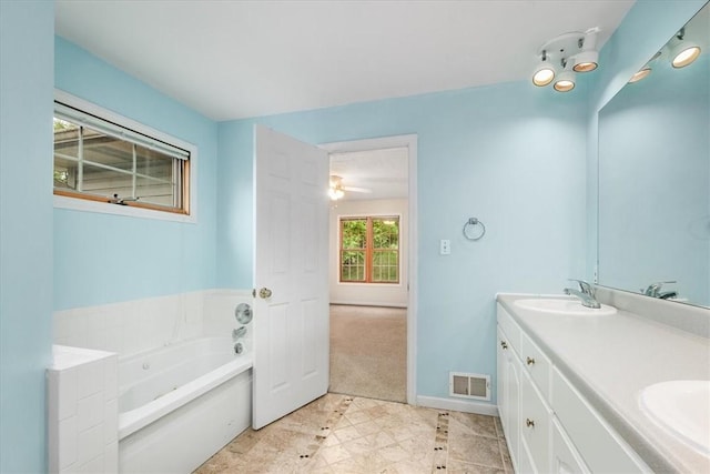 260 Fox Meadow Dr, Pine Twp Nal, PA 15090 - full bathroom featuring a bath, double vanity, inlaid floor details, tile patterned floors, and baseboards
