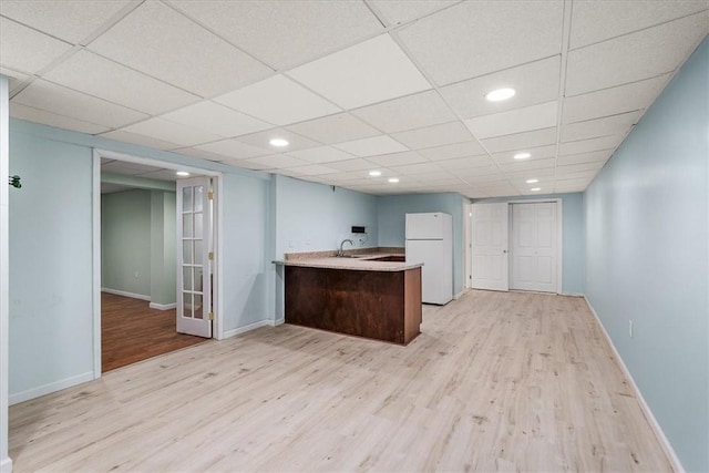 260 Fox Meadow Dr, Pine Twp Nal, PA 15090 - kitchen with freestanding refrigerator, a peninsula, light wood-type flooring, baseboards, and recessed lighting